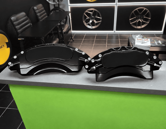 Black caliper covers by Leprecon Plus