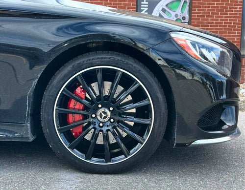 Closeup to Mercedes red custom caliper cover by Leprecon Plus.