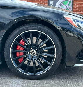 Closeup to Mercedes red custom caliper cover by Leprecon Plus.